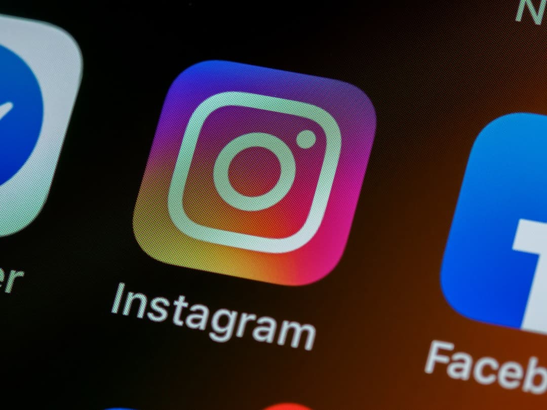 The Instagram app icon on a smartphone screen